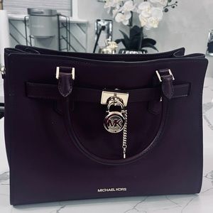 Medium size plum leather Michael Kors bag
